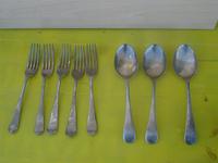 5 tenedores y 3 cucharas posible plata