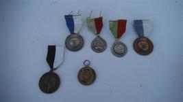 6 medallas conmemorativas