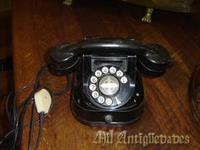 Telefono redondeado hierro antiguo y asas